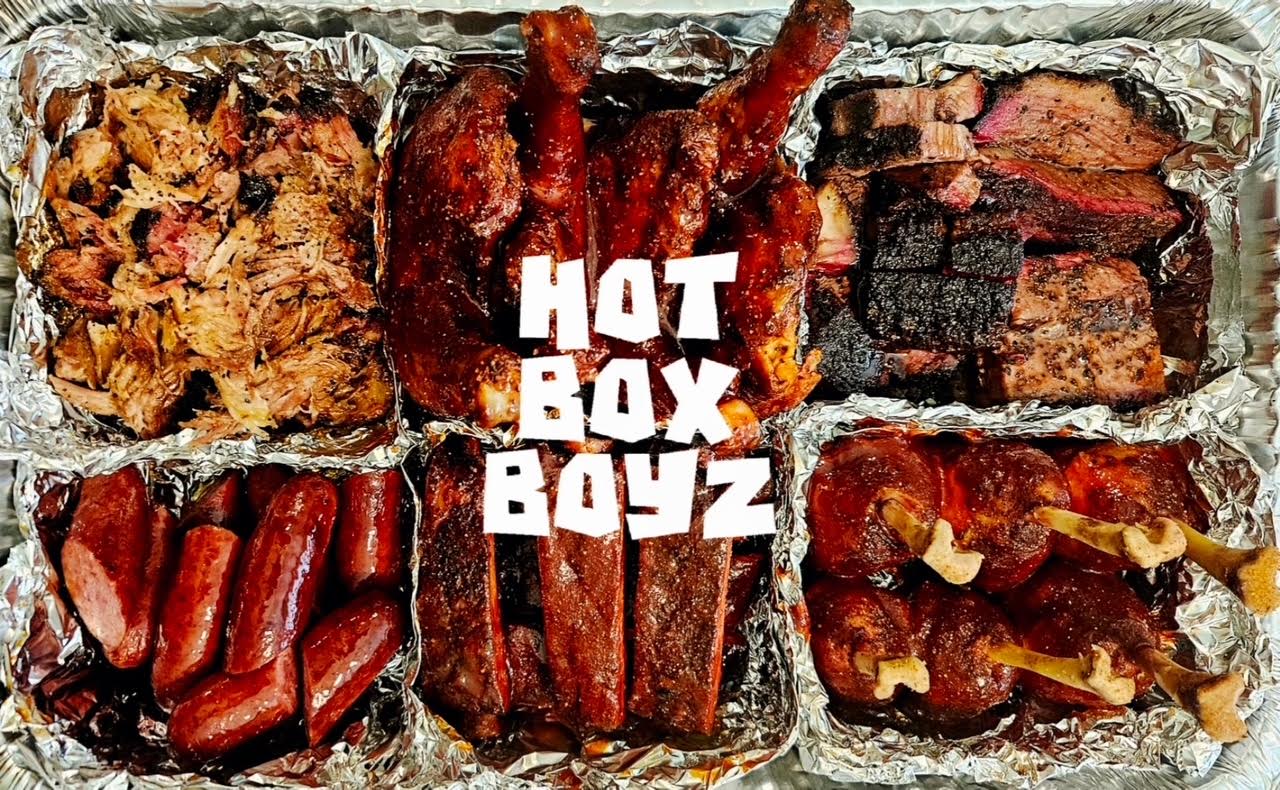 The Hot Box sampler tray with brisket, ribs, pulled pork, chicken, sausage